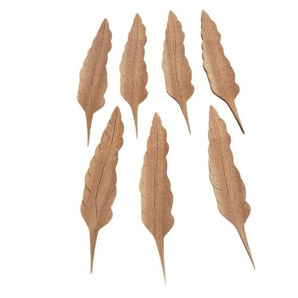 7 Hand Carved 5 3/8” Wooden Feathers